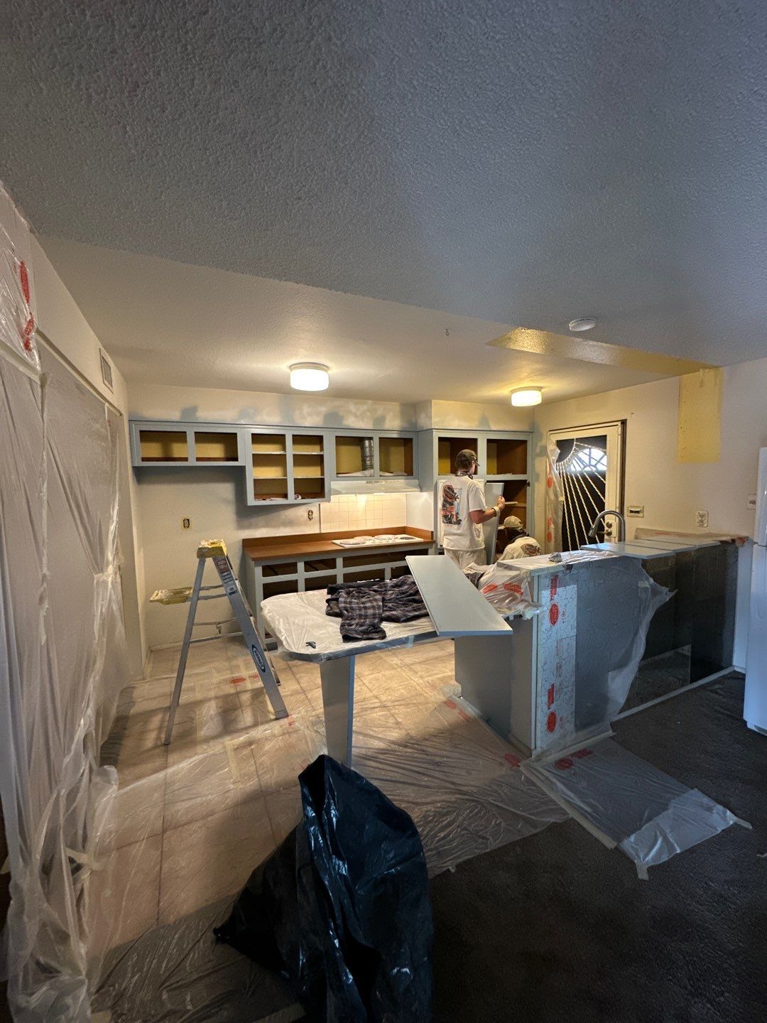 Cabinet Painting Project: E Cairo Dr • Tempe, AZ 1 Cabinet Painting Project in E Cairo Dr. Tempe.